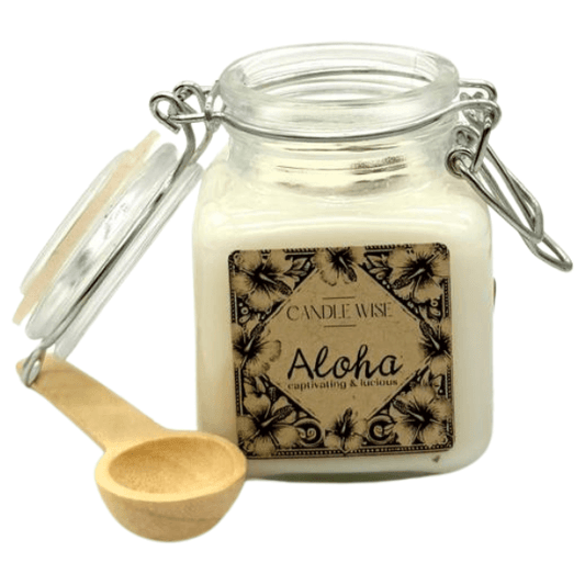 Aloha Scoopable Wax Melt in a jar with a wooden scoop, labeled 'Candle Wise Aloha captivating & luxurious'.