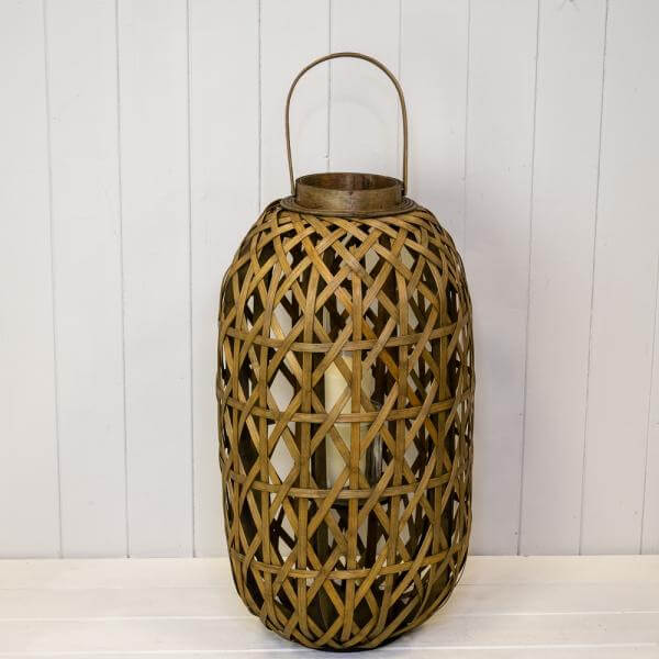Medium Oval Bamboo Lantern with Glass Insert H55.5, D30cm displayed on a wooden surface.