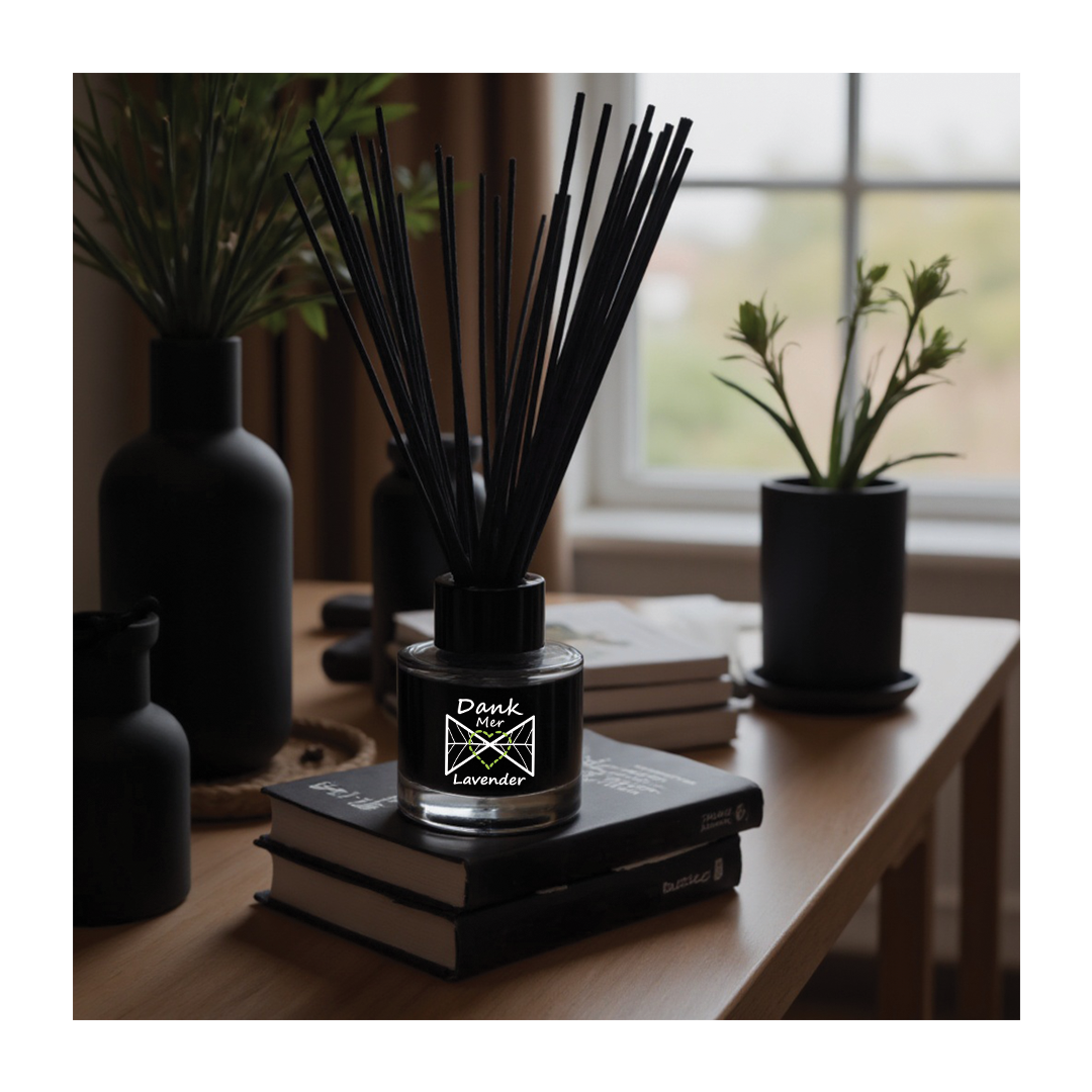 Lavender Essential Oil Single Diffuser on a table with black vases and books, creating a calming atmosphere.