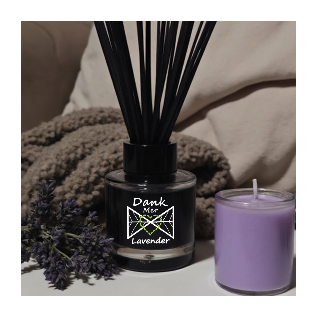 Lavender Essential Oil Single Diffuser in a cozy setting with lavender flowers and a purple candle.