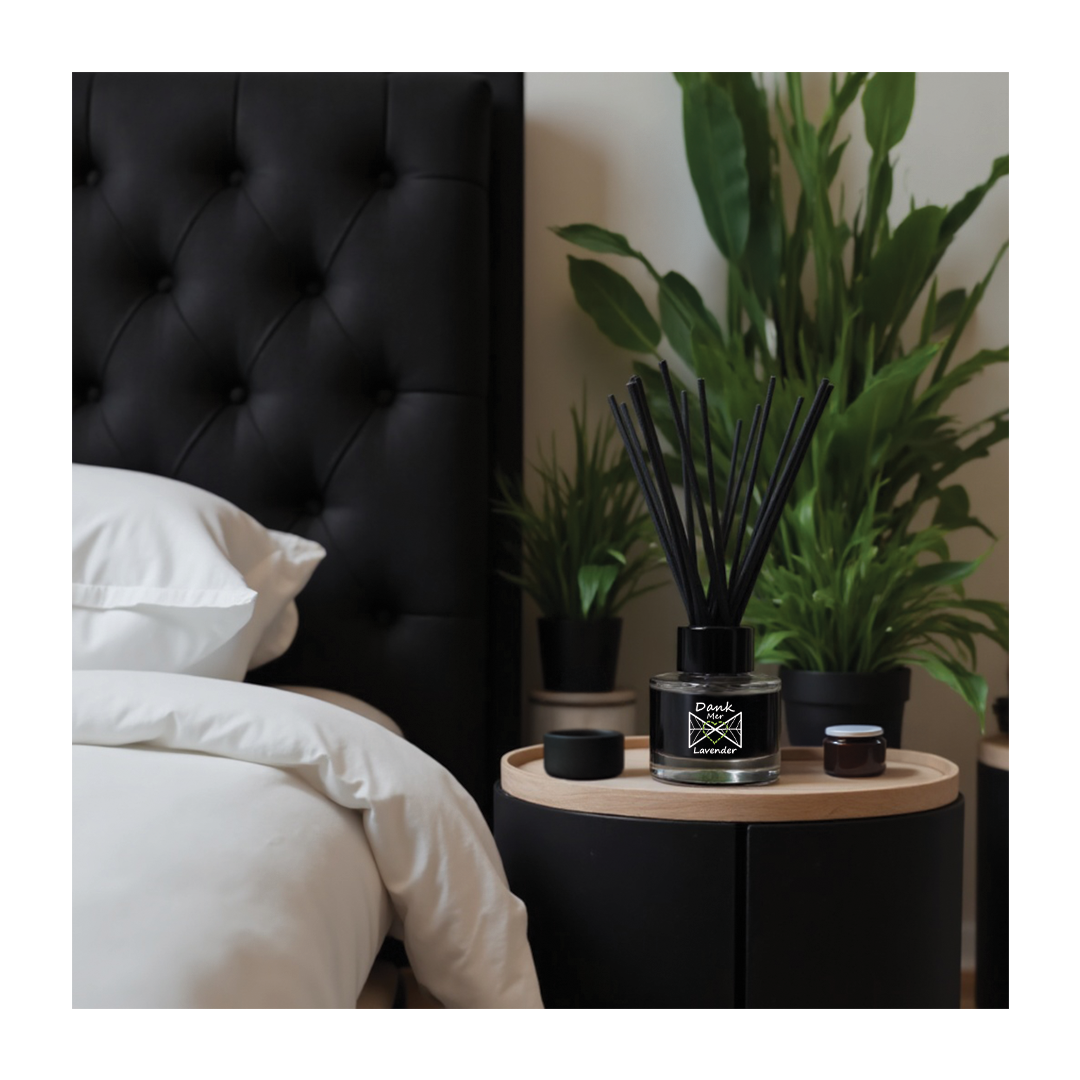 Lavender Essential Oil Single Diffuser displayed on a nightstand beside plants and bedding.