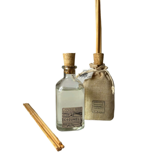 Cozumel Long Lasting Reed Diffuser with glass bottle, rattan sticks, and natural packaging.