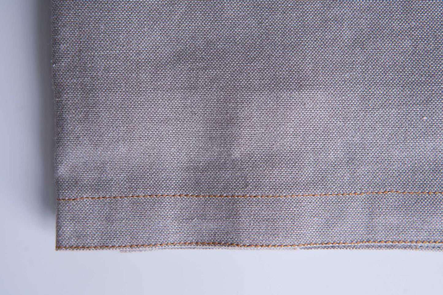 Close-up of Kitchen Towel Grey - Pack of 2 - Organic Cotton with chambray weave and fine stitching.