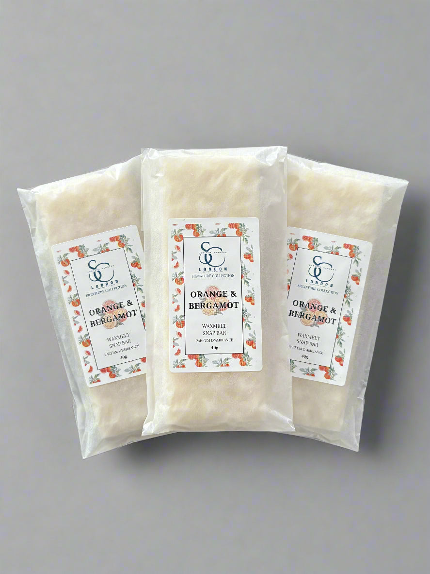 Orange & Bergamot Wax Melt Snap Bar 40g Luxury Soy Blend packaging displayed in three clear bags.