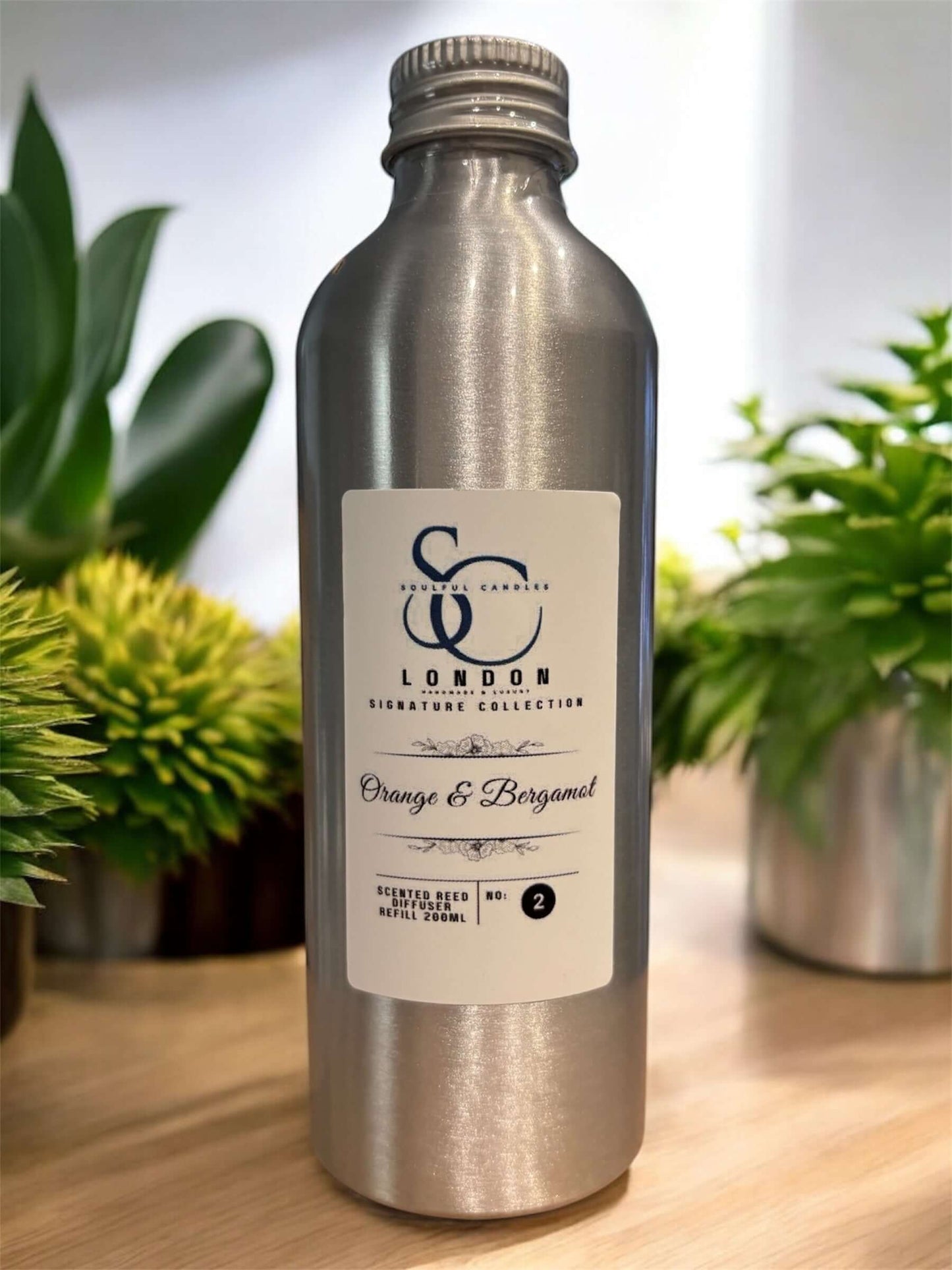 200ml Diffuser Refills Long-Lasting Luxury Home Fragrances in metallic bottle, featuring Orange & Bergamot scent.