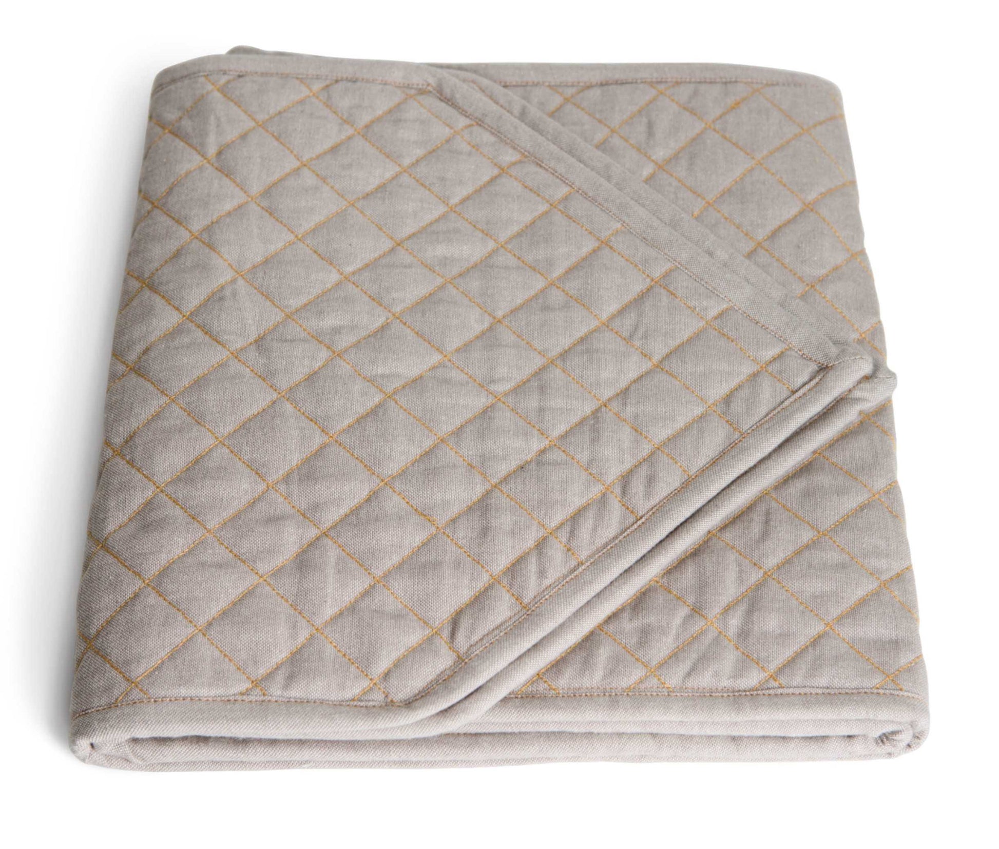 Quilted Table Runner - Organic Cotton, featuring a luxurious chambray weave and soft quilted design.