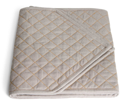 Quilted Table Runner - Organic Cotton, featuring a luxurious chambray weave and soft quilted design.
