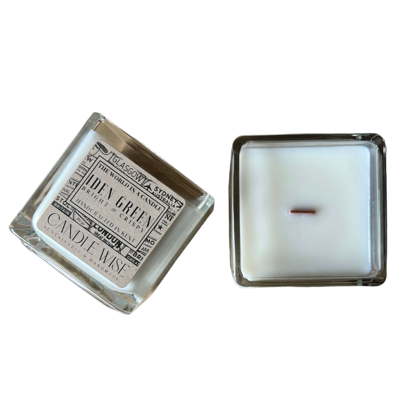 Iden Green Large Scented Candle in a clear glass container with a wooden wick, showcasing its elegant design and fresh aroma.