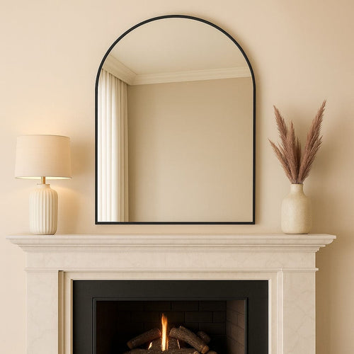 Akiko - Black Metal Arched Mirror - 120cm x 95cm above a mantel with a lamp and decorative vase
