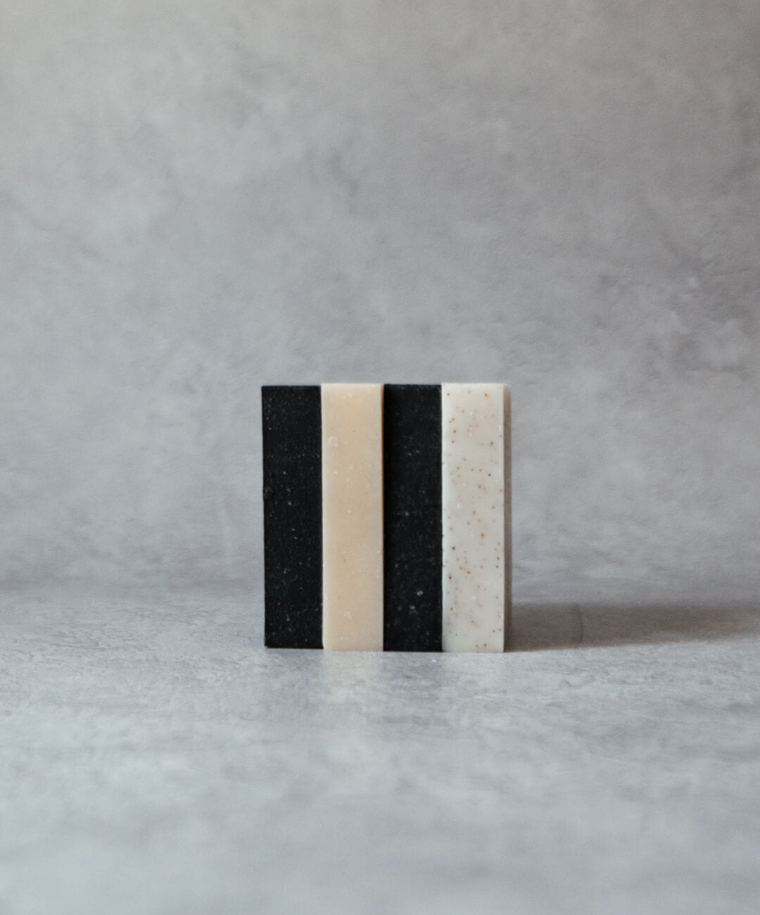 Natural Soap Bar Bundle 4 pack featuring four handcrafted bars in black and white.