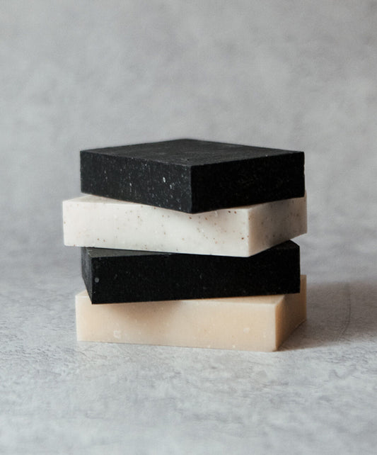 Natural Soap Bar Bundle 4 pack of four handcrafted natural soap bars stacked on a light background.
