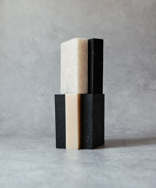 Natural Soap Bar Bundle 5 pack featuring handcrafted black and white soap bars stacked elegantly.