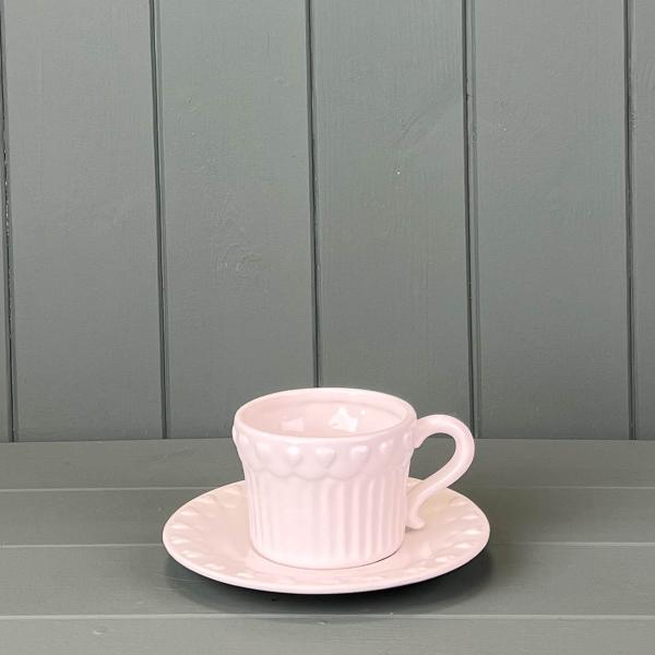 White Ribbed Ceramic Cup and Saucer with Heart Pattern