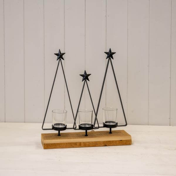 Black Metal Triple Tree Tealight Holder on Wooden Base showcasing three tealight holders with star accents.