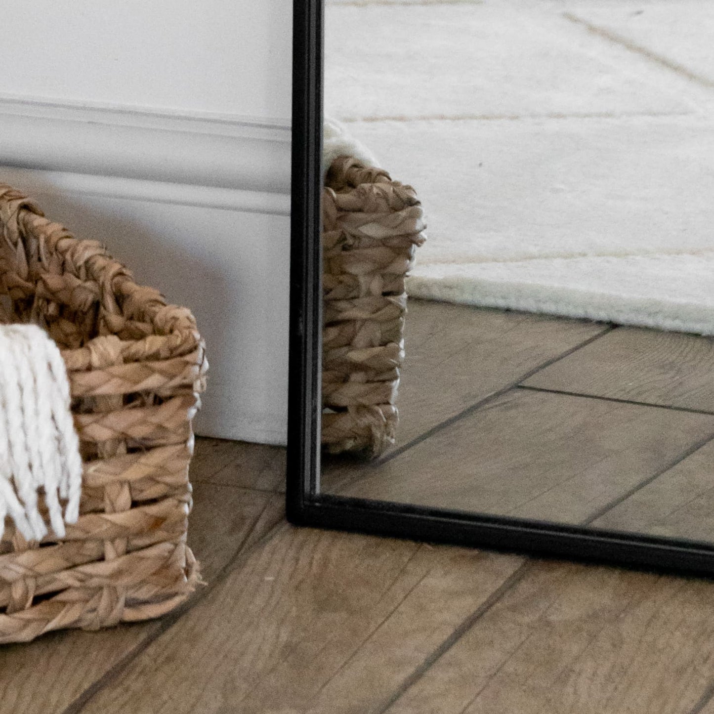 Yoko - Full Length Black Metal Gentle Arch Mirror - 180cm x 90cm detail with basket and floor reflection